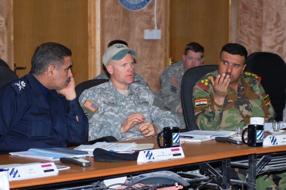 Coalition forces, Iraqi security forces gather for voter registration planning session