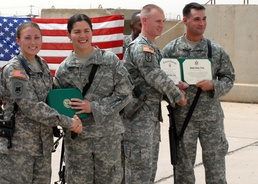 Married Army couples take part in rare reenlistment ceremony
