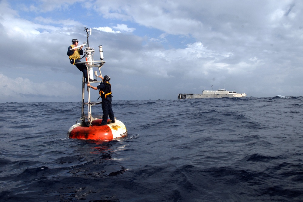 Sailors repair NOAA Pirata bouy