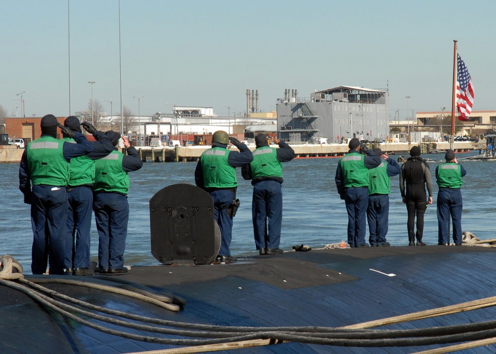 Tending to mooring lines at Naval Station Norfolk