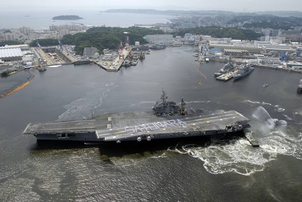 USS Kitty Hawk departs Yokosuka