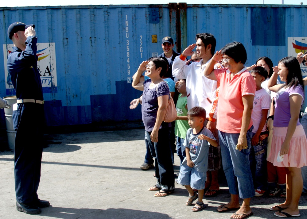 Filipinos learn how to salute flag