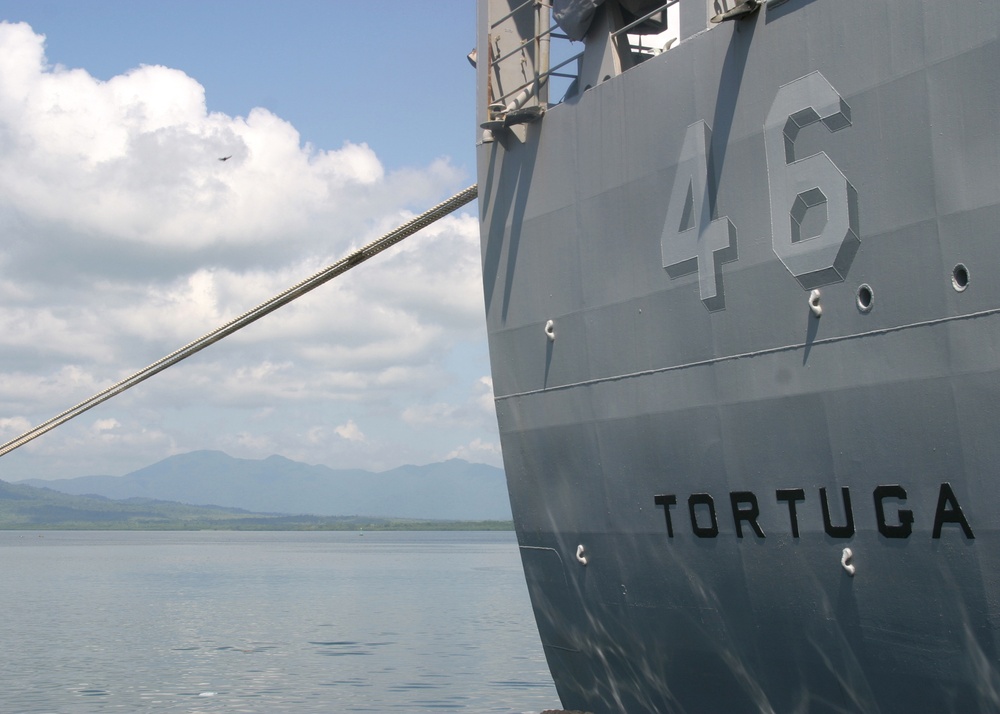 USS Tortuga docks in Puerto Princesa