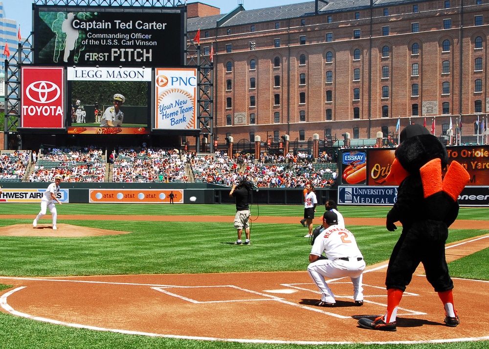 Officer throws first pitch at Camden Yards