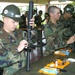 Seabees clean weapons on Okinawa