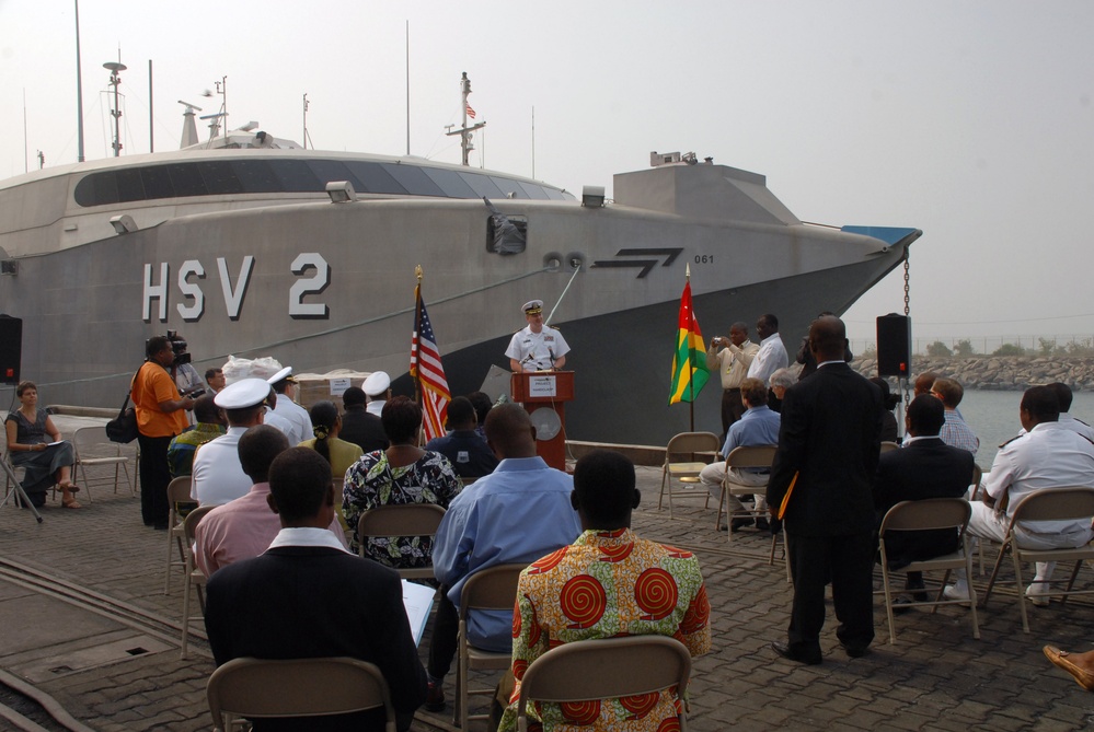 Sailors play soccer with African children