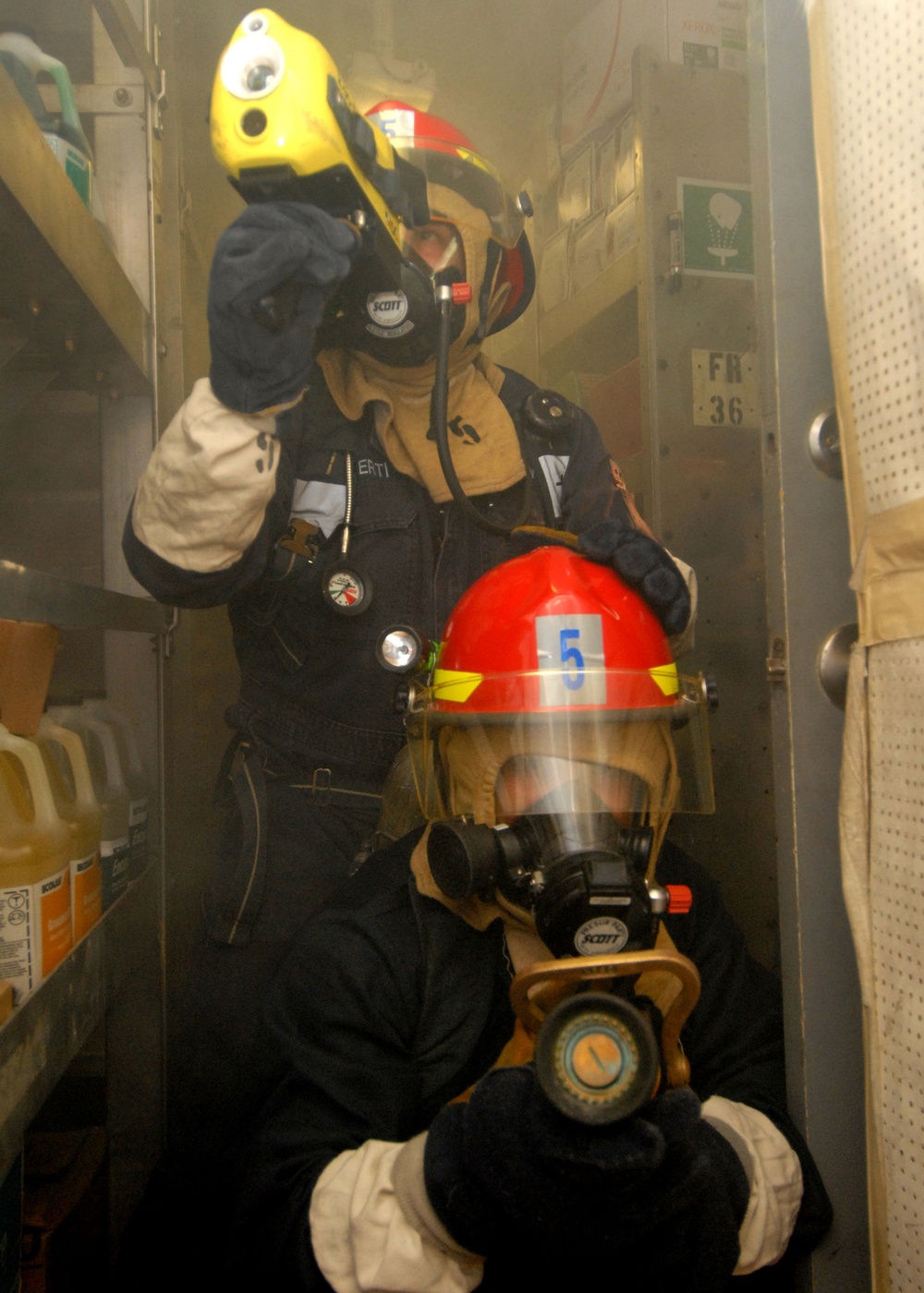 USS Lake Erie Sailors practice firefighting techniques