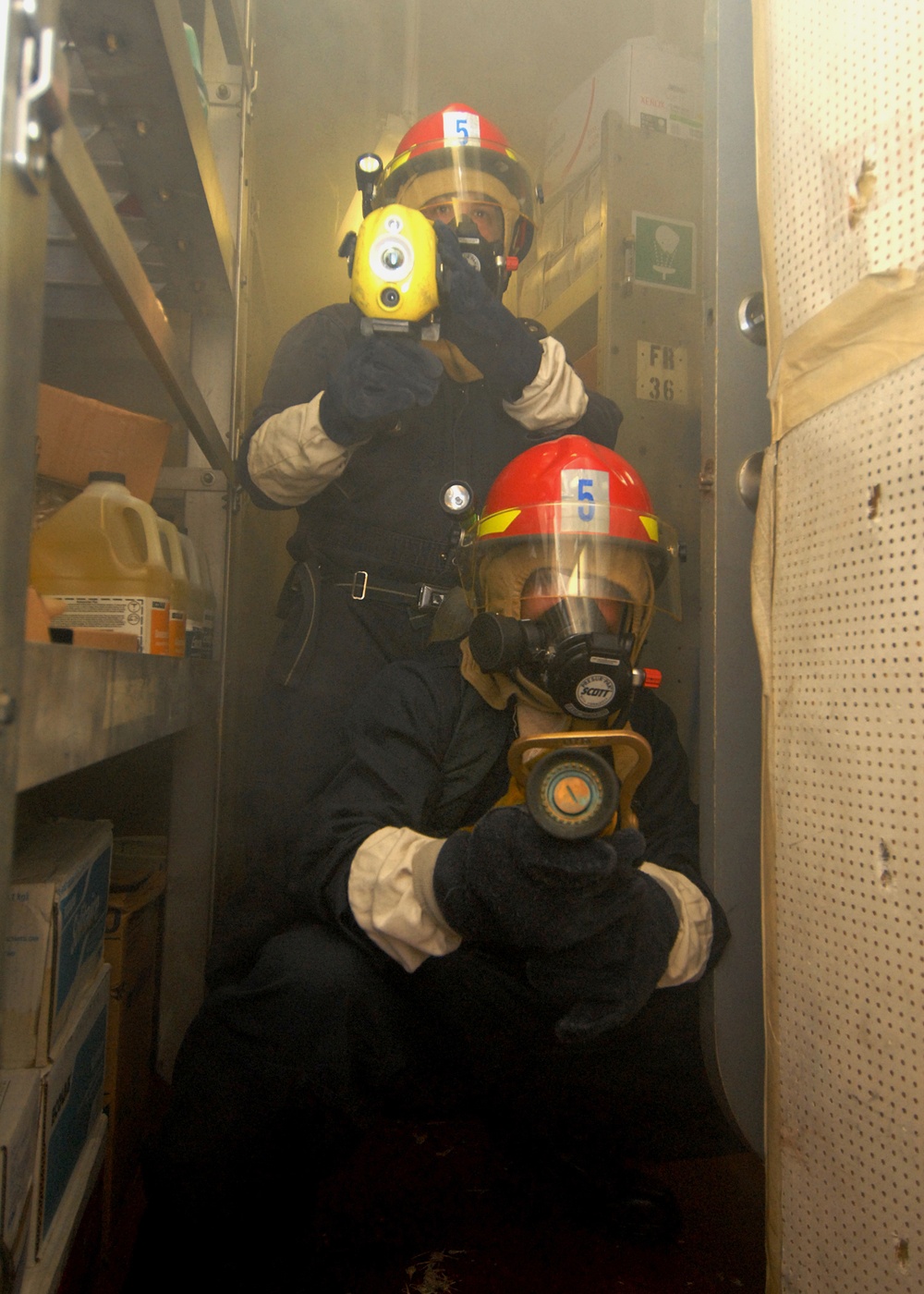 USS Lake Erie Sailors practice firefighting techniques