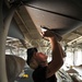 Sailors maintain fuel tanks aboard USS Abraham Lincoln