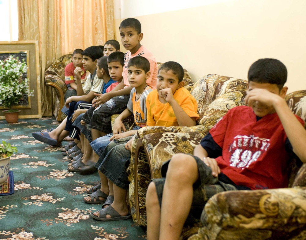 Soldiers, Iraqi Police Visit Kut Orphanage Soldiers, Iraqi Police Visit Kut Orphanage