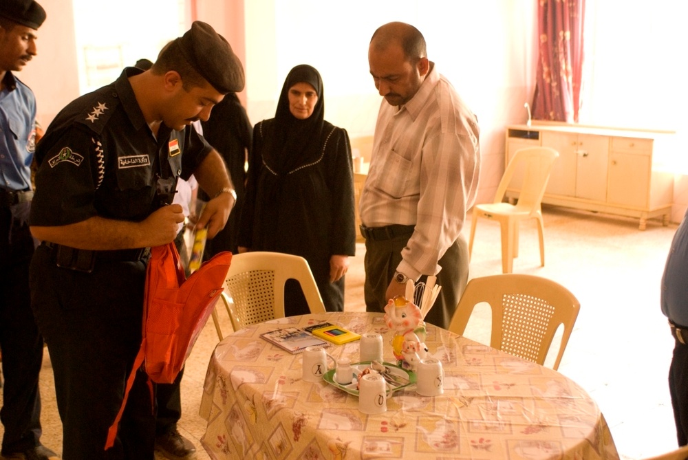 Soldiers, Iraqi Police Visit Kut Orphanage Soldiers, Iraqi Police Visit Kut Orphanage