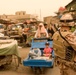 Civil Affairs Soldiers speak with Kut shopkeepers