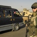 Iraqi Army and Polish Soldiers Conduct Checkpoint