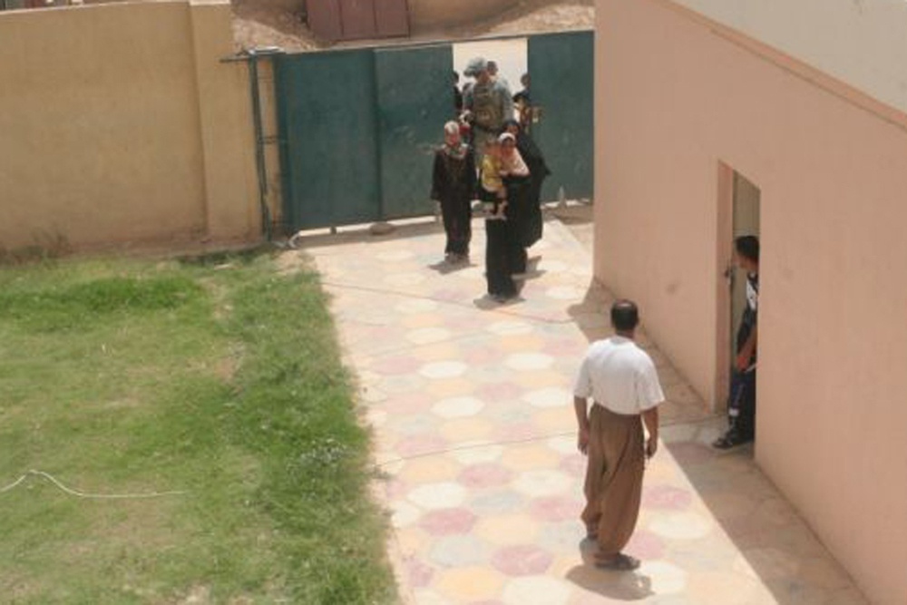 Iraqi women stop sewing and start talking