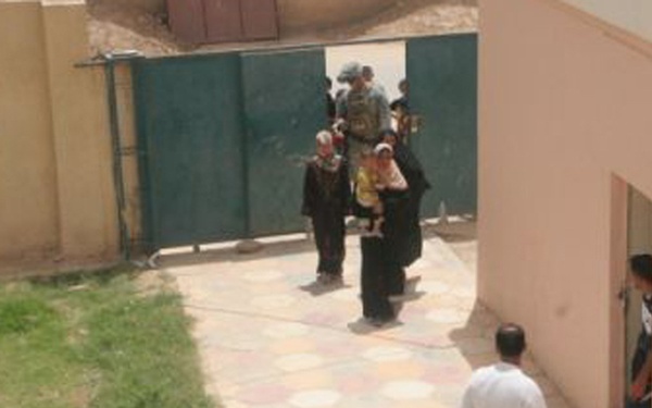 Iraqi women stop sewing and start talking