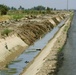 Rebuilt irrigation canals flow fresh water to Taji farms