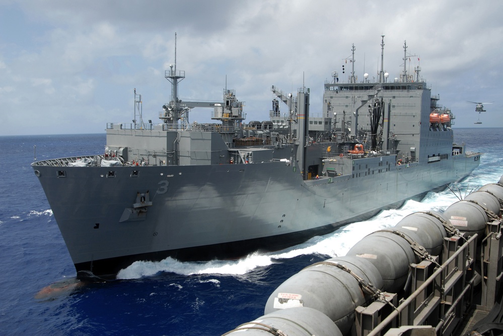 USS Nimitz offloads munitions while underway