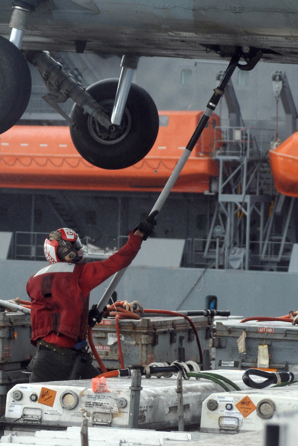 USS Nimitz offloads munitions while underway