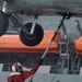 USS Nimitz offloads munitions while underway