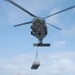 USS Nimitz offloads munitions while underway