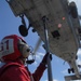 USS Nimitz offloads munitions while underway