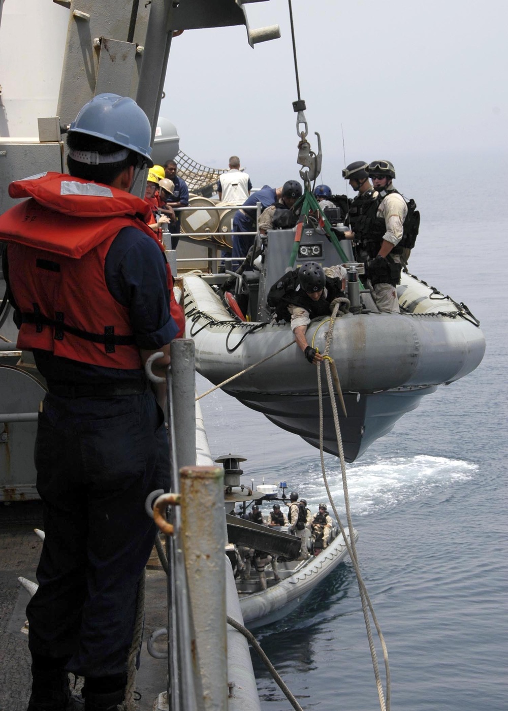 USS Nimitz offloads munitions while underway