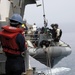 USS Nimitz offloads munitions while underway