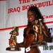 Competitors flex and pose for gold in Iraq