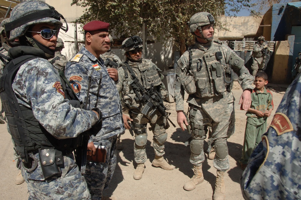 DVIDS - Images - U.S., Iraqi forces patrol Rashid district [Image 7 of 15]