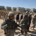 U.S., Iraqi forces patrol Rashid district