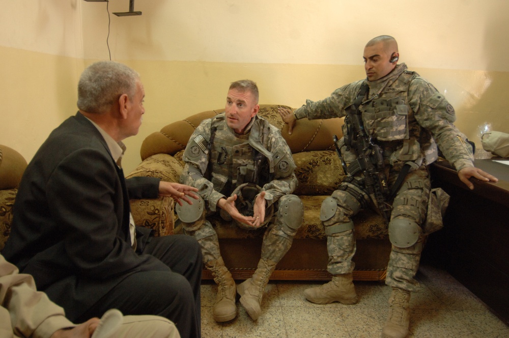 U.S., Iraqi forces patrol Rashid district