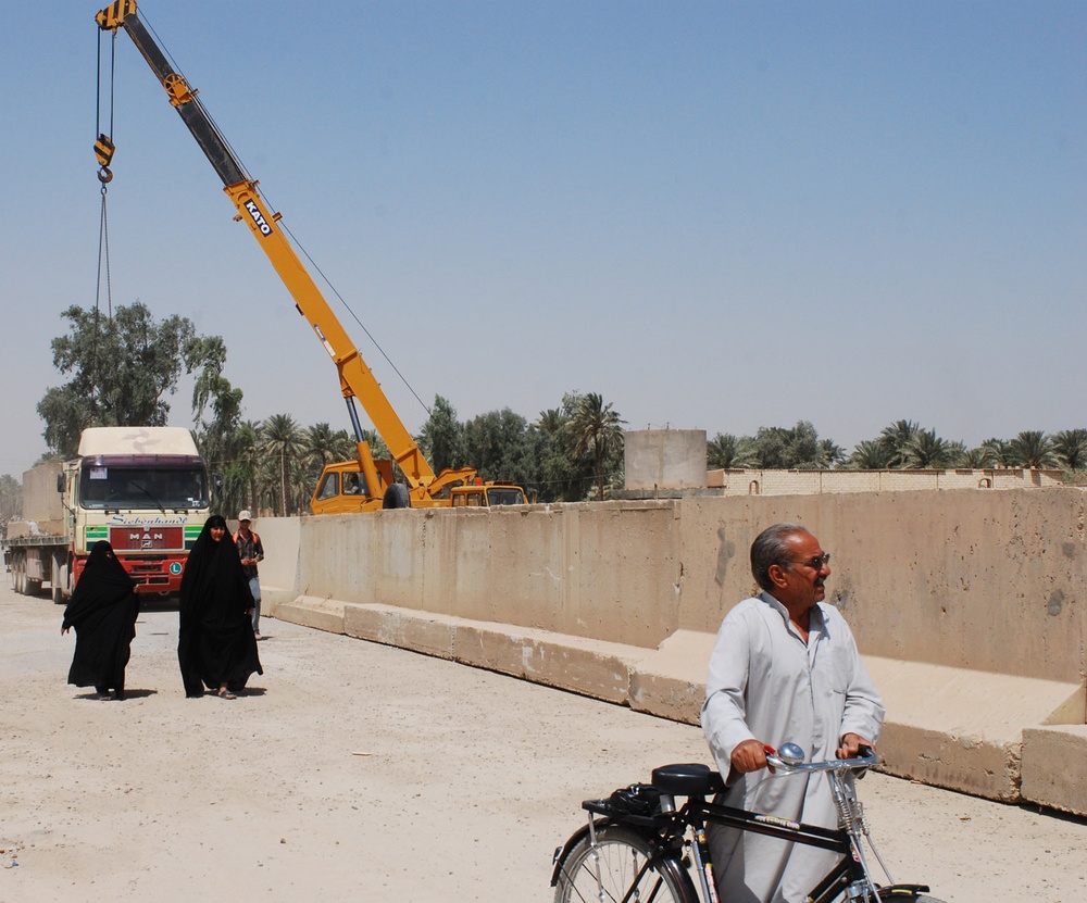 Barrier emplacement opens roads in Abu Ghuraib