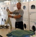 Joint Task Force Guantanamo Trooper Cleans Clothes