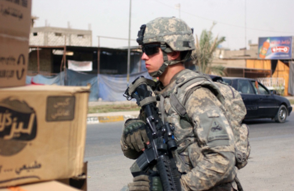 Regulars conduct foot patrol through Thawra 2