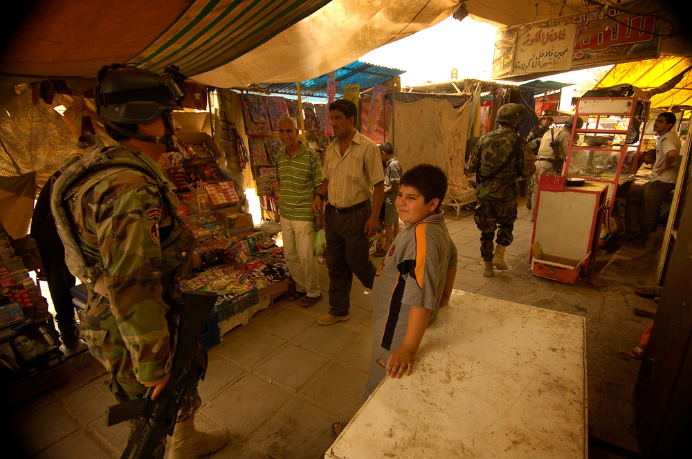 Iraqi Army Soldier in Sadr Marketplace