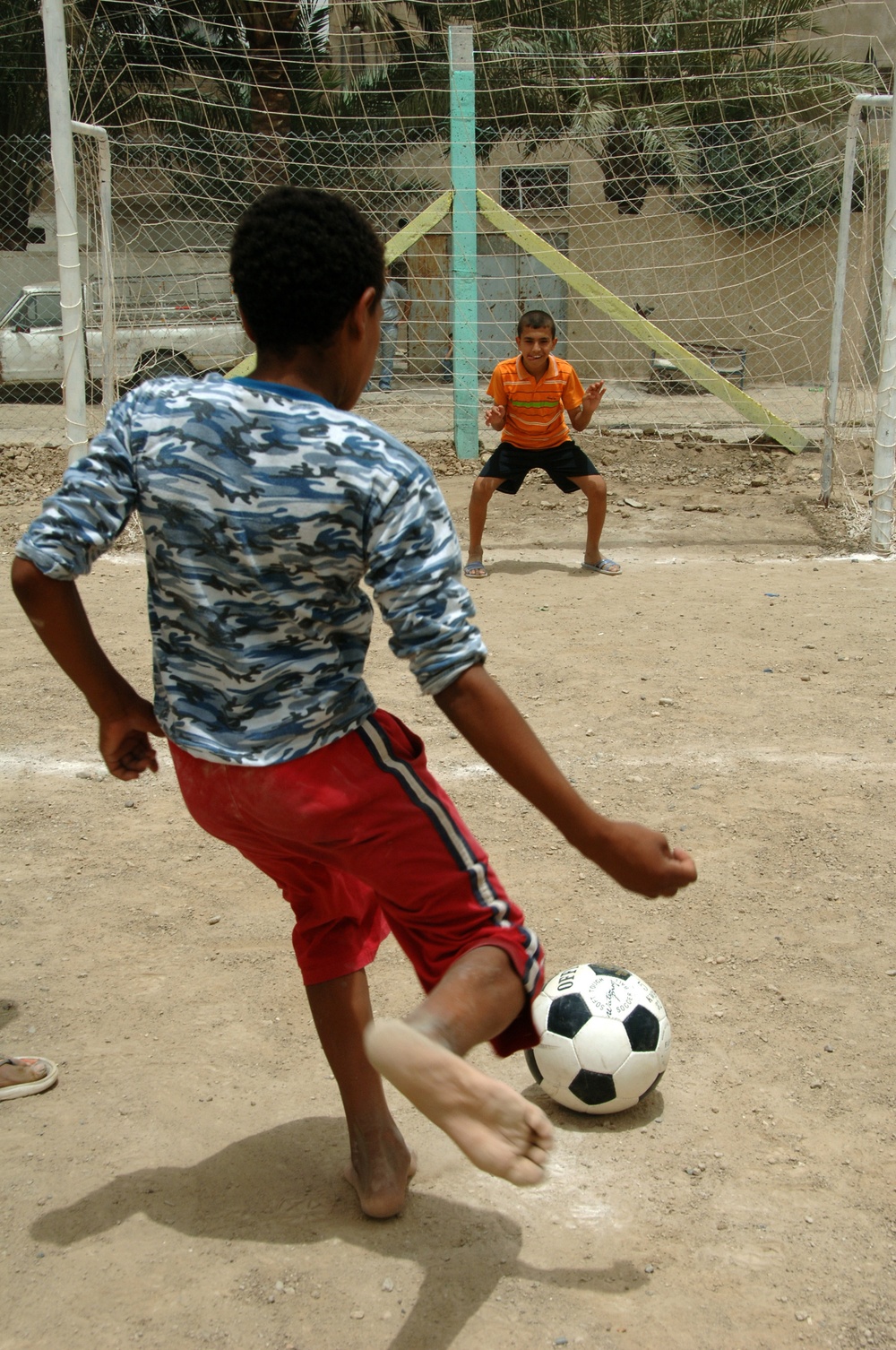 Iraqi Youth Receive Play Soccer