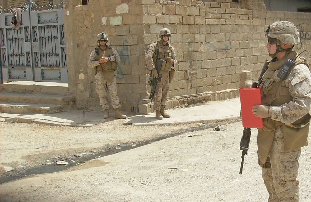Marine honors brother, fallen Marines with promotion