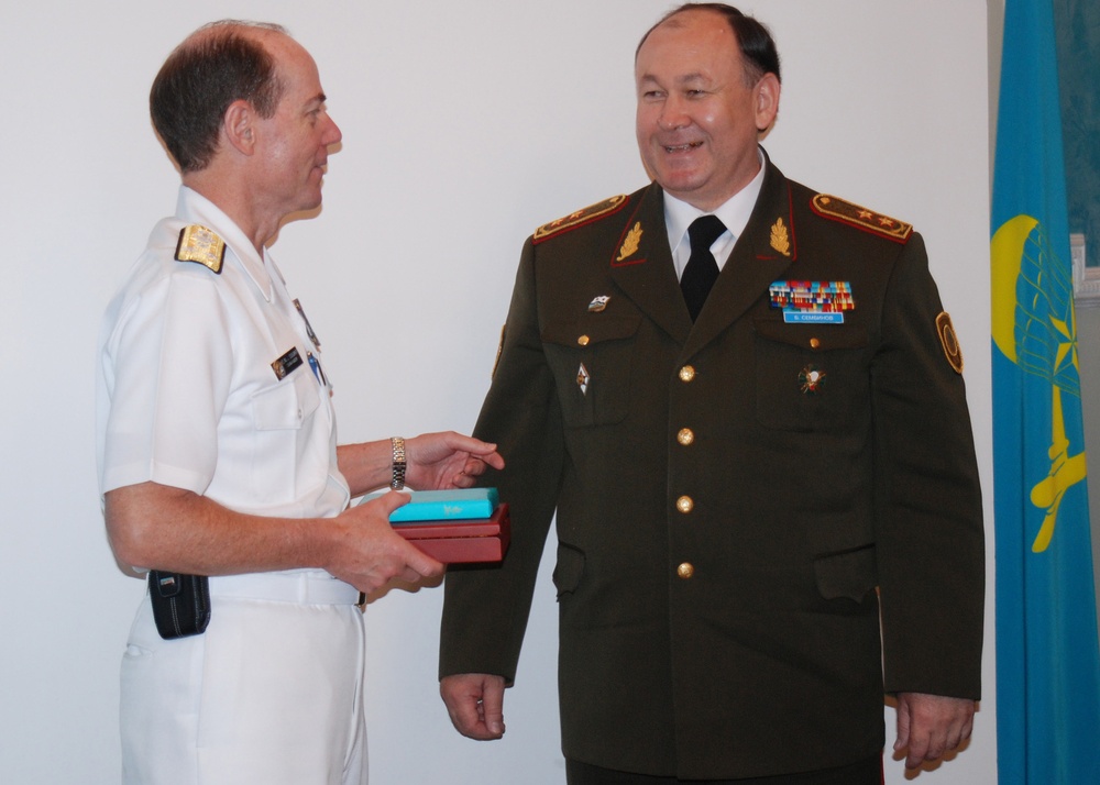 Vice Adm. Kevin Cosgriff meets with Kazakhstan Navy officials at the Ministry of Defense headquarters in Astana, Kazakhstan