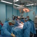 Sailors conduct surgical procedure during Pacific Partnership mission