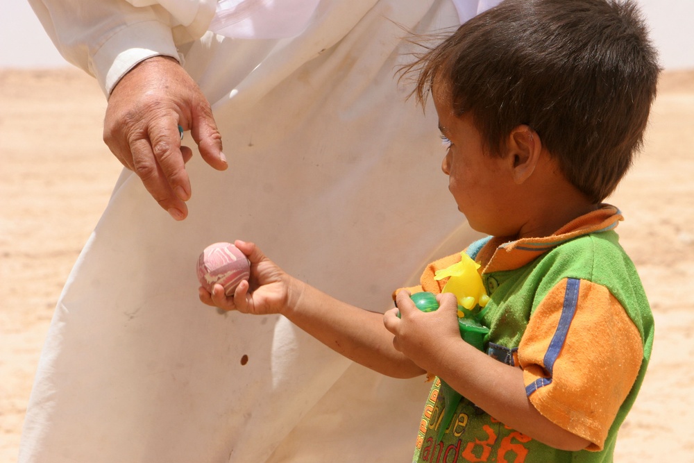 U.S. Marines Hand Out Toys in the North