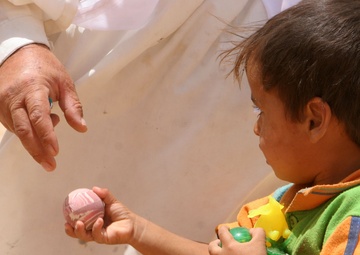 U.S. Marines Hand Out Toys in the North