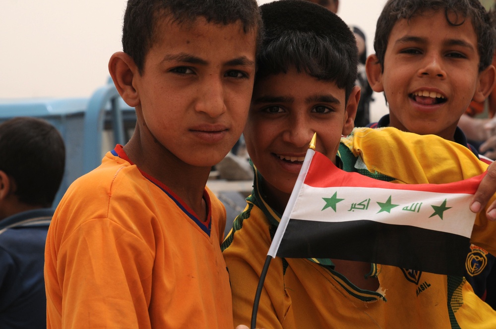 Iraqi Boys Show Off Their Flag With Pride