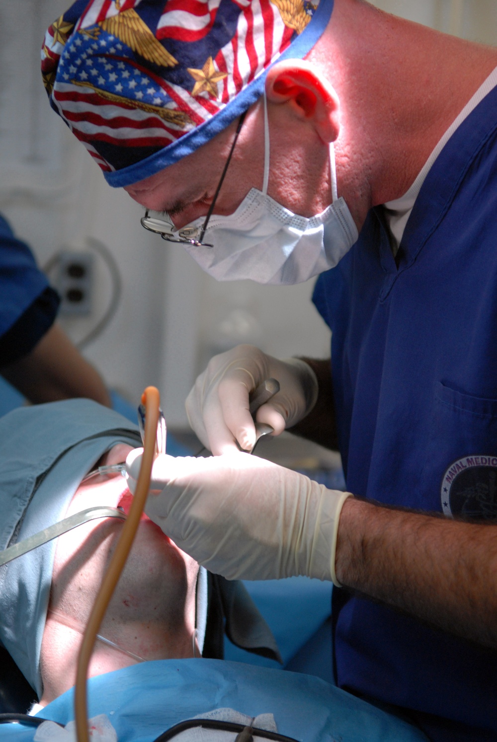 Sailors perform dental work aboard USS Ronald Reagan