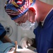 Sailors perform dental work aboard USS Ronald Reagan