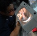 Sailors perform dental work aboard USS Ronald Reagan