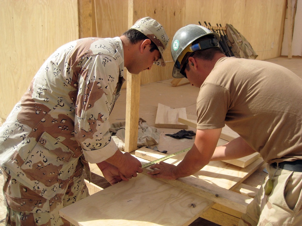 Seabees build huts