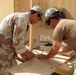 Seabees build huts
