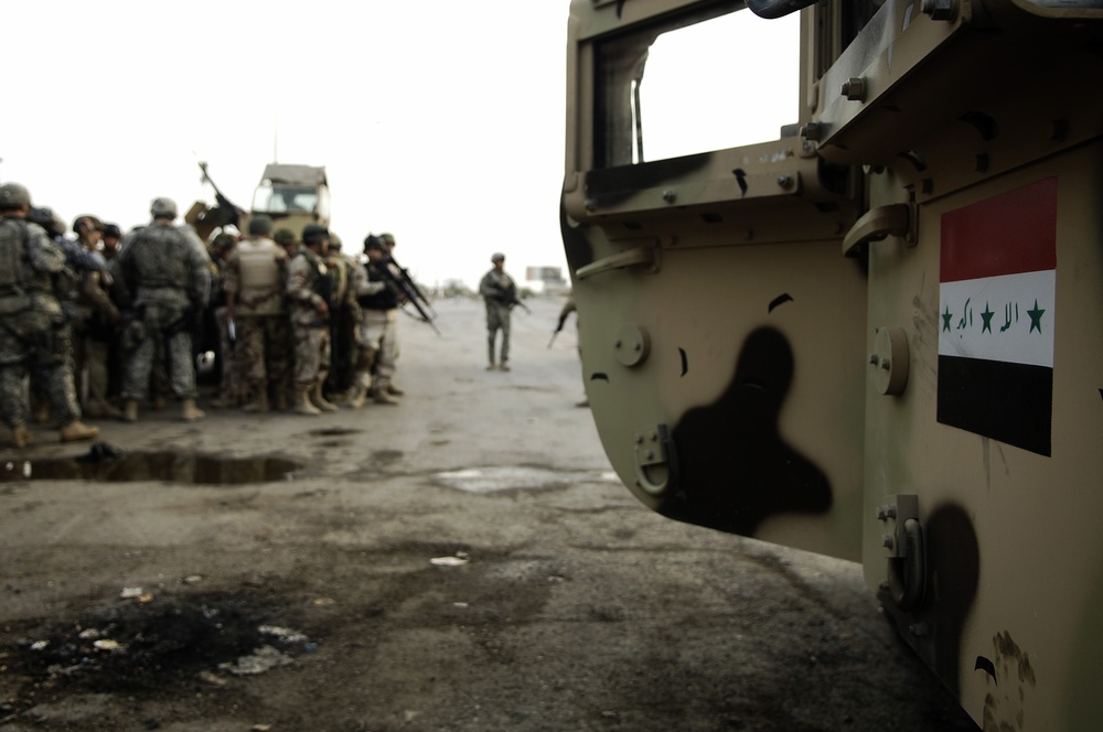 Security check on soldiers in the Sadr City District