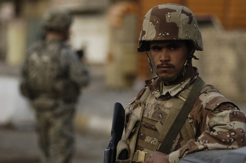 Security check on soldiers in the Sadr City District