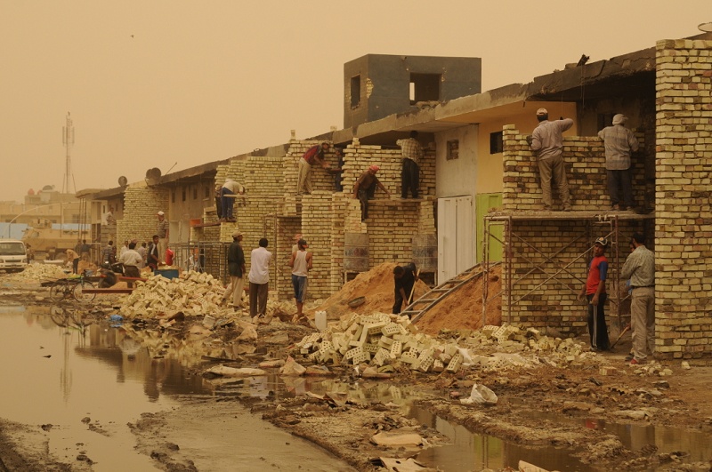 Iraqis rebuild market brick by brick